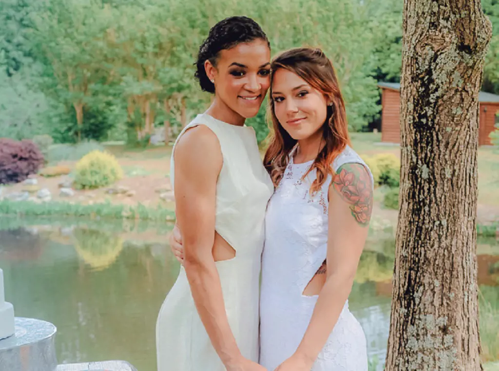 Andraya Carter and Bre Austin posing for their wedding photoshoot