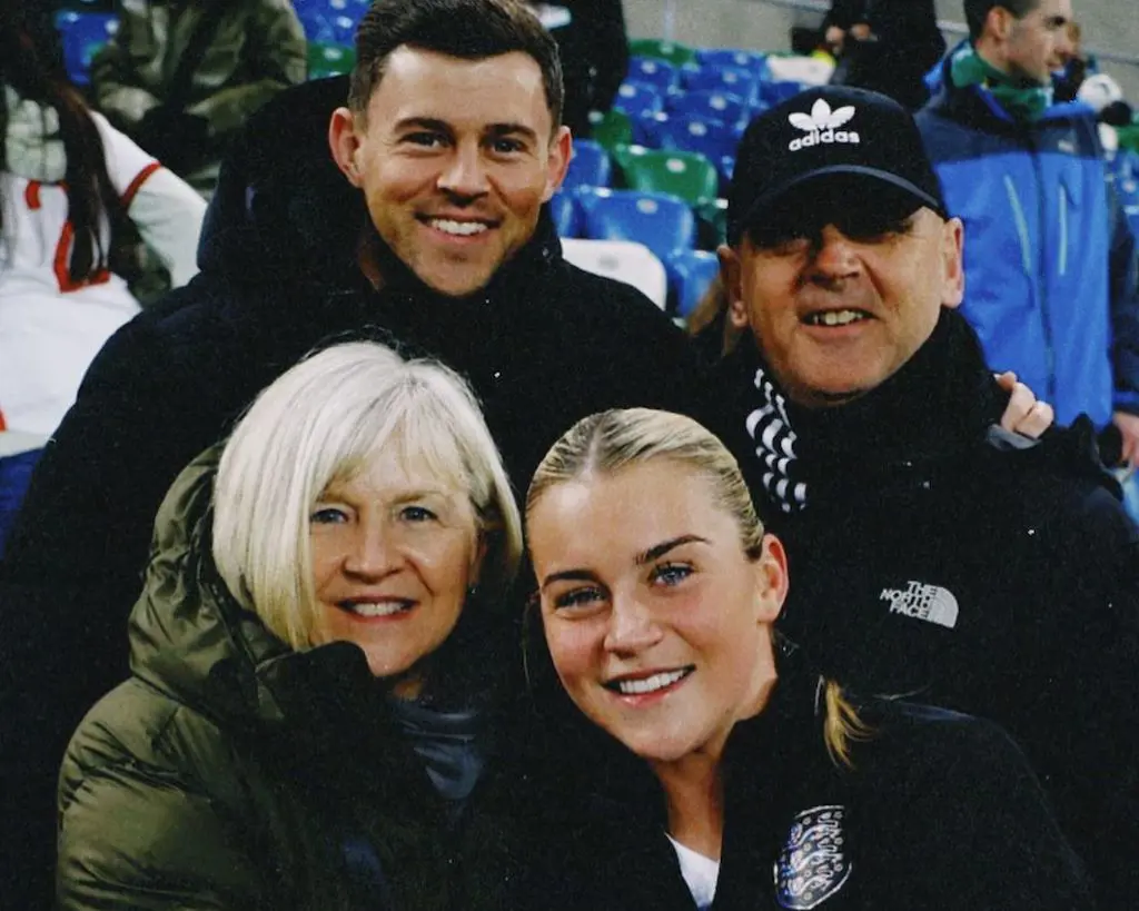 Russo with her family when they came on to cheer her on during the Championship
