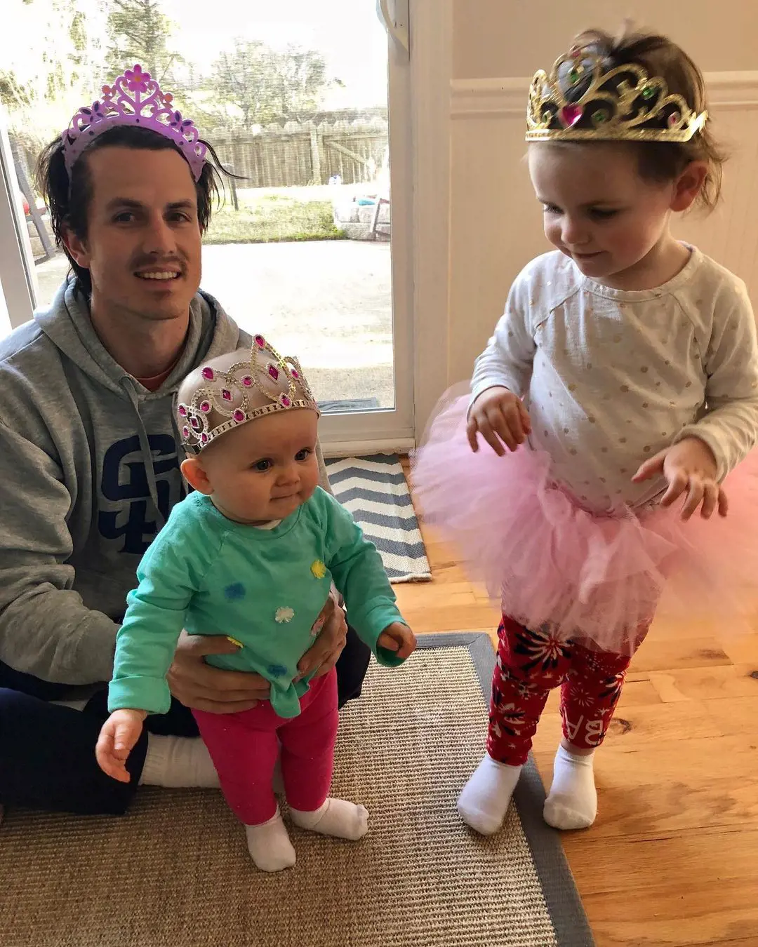 John posted a picture with his two beautiful daughters