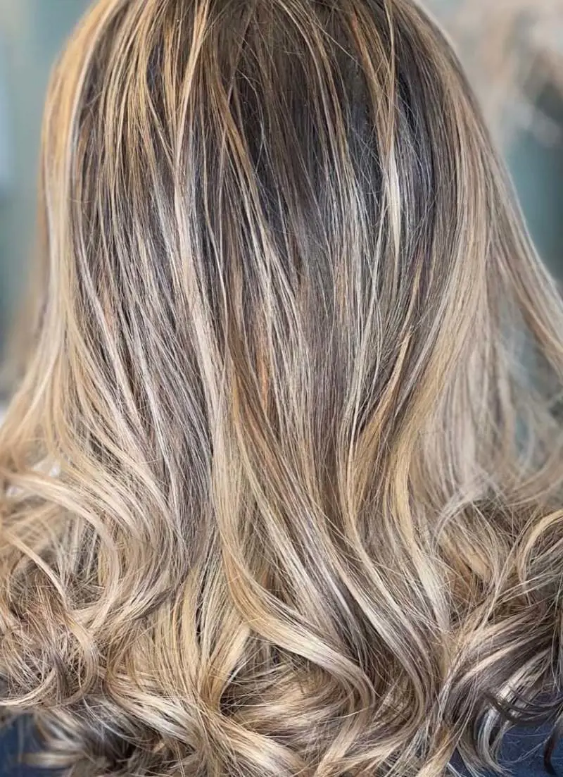 A stunning dimensional bronde balayage infusing your hair with depth and radiant glow