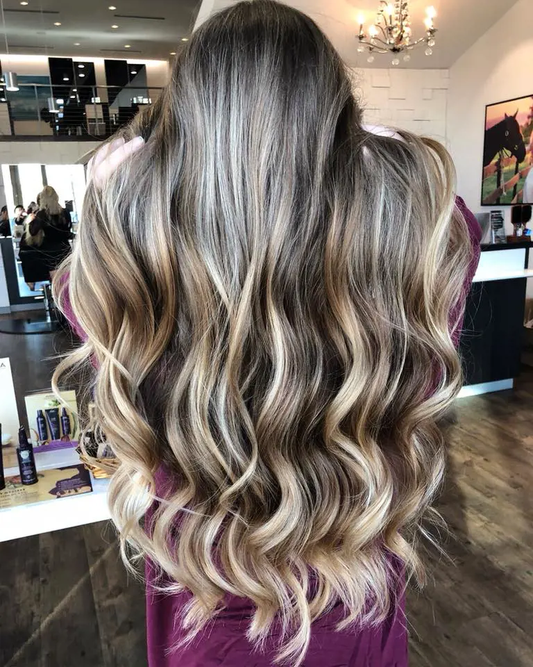 Foilayage is a combination of balayage with the use of foils more often seen in the traditional application of highlights