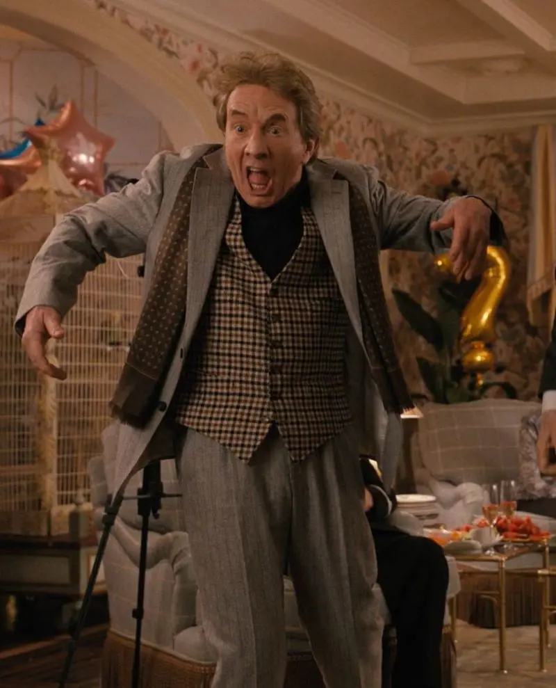 Oliver Putnam (portrayed by Martin Short) having a fun time at a killer reveal party