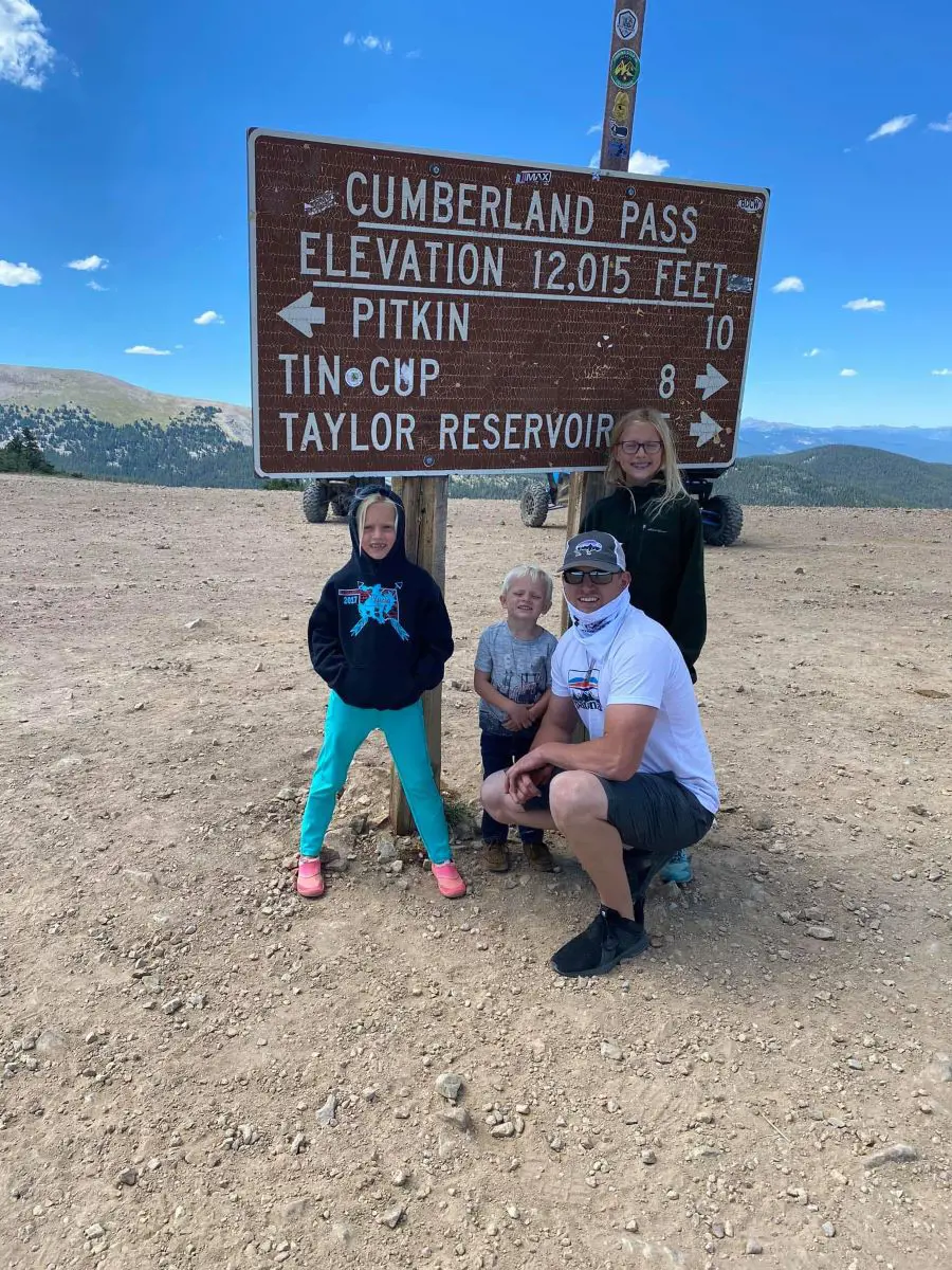 Heaton's brother in Cumberland Pass (elevation 12,034 feet) with his three kids