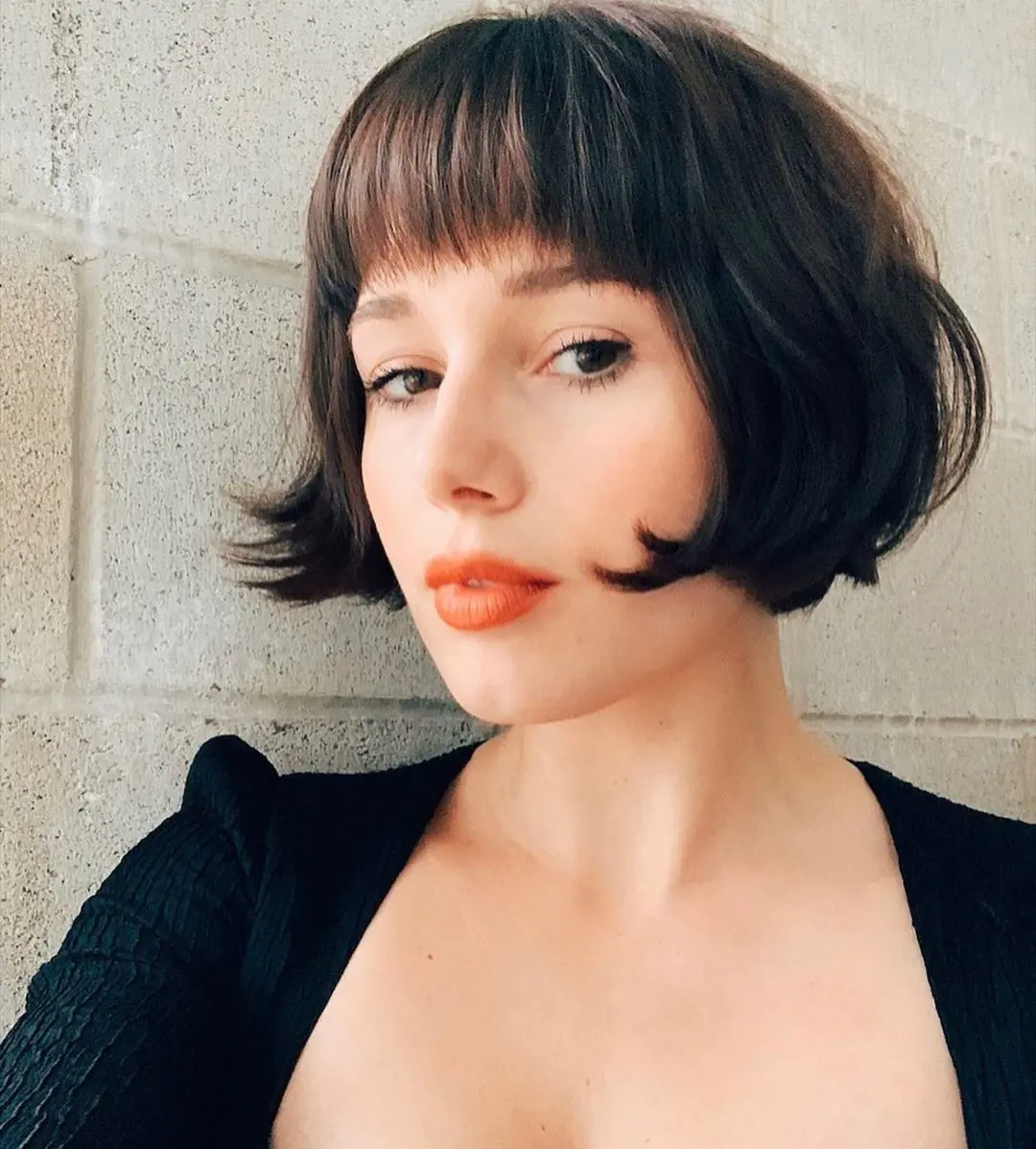 French Bob is shorter then the classical bob cut and it looks beautiful with a fringe on it