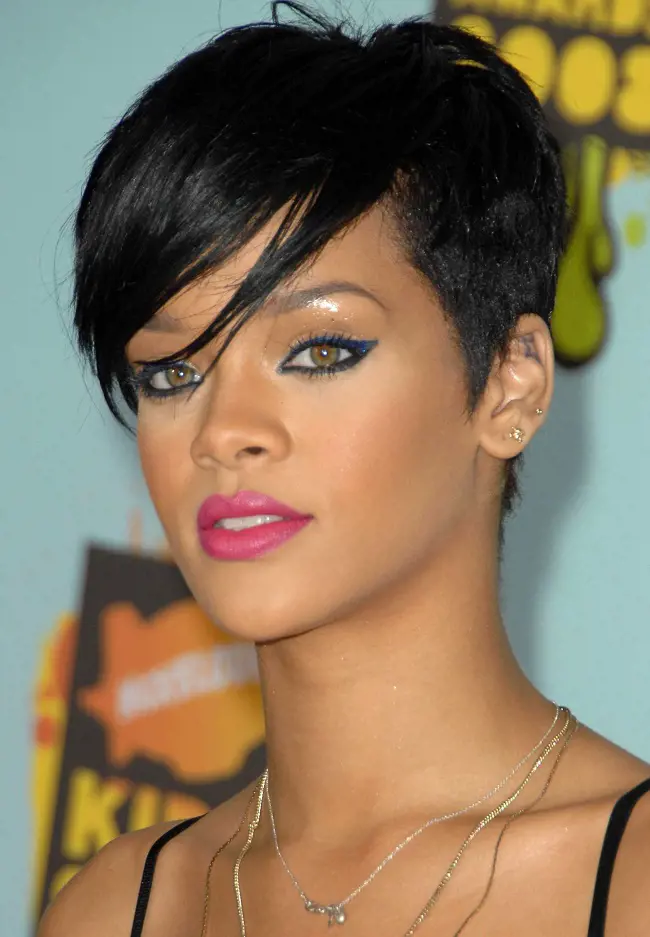 The celebrated artist Rihanna looking beautiful in her short pixie with Side swept bangs