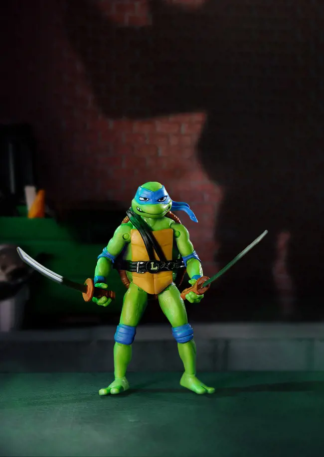 Leonardo Ninja Turtle is identified by his blue face mask