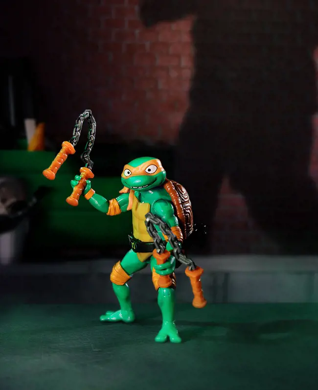 Michelangelo Ninja Turtle is identified by his orange mask and he is engergetic by nature