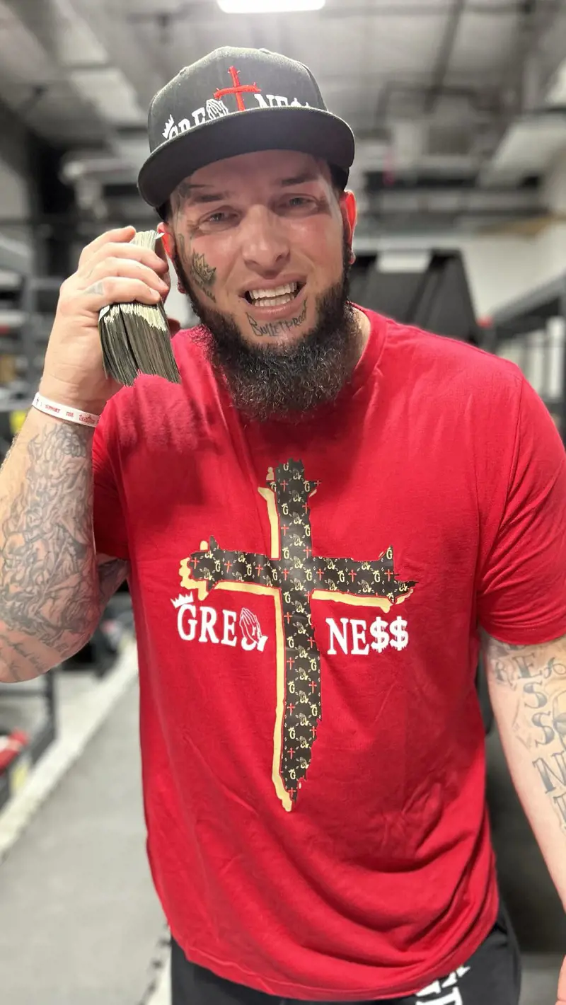 The Real Greatness real name is Jason Stephen Jensen. On The Real Greatness reinvented website, people grab the new Greatness pattern shirt in red or 'black' plus