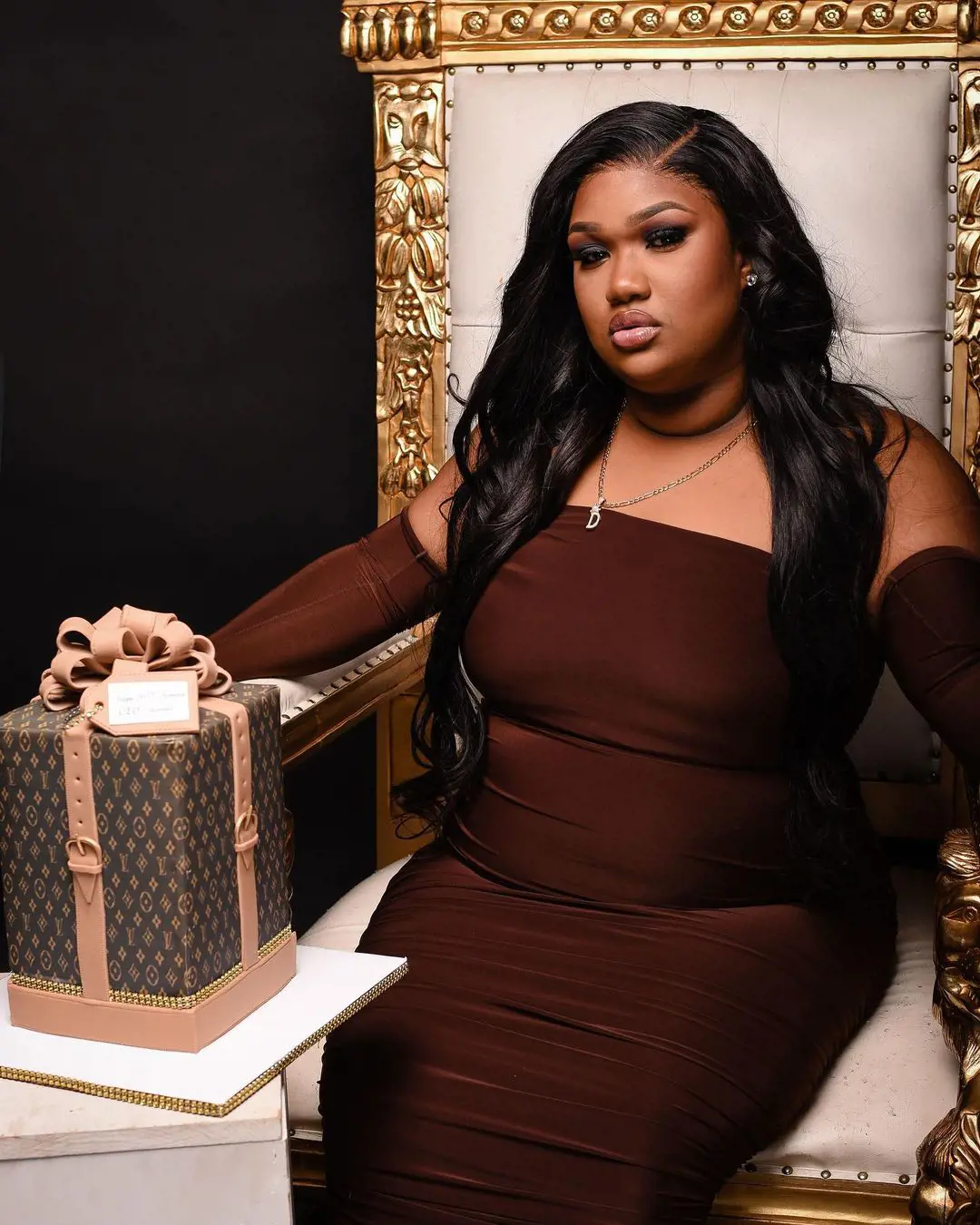 Biggie on her 26th birthday with a Louis Vuitton bag